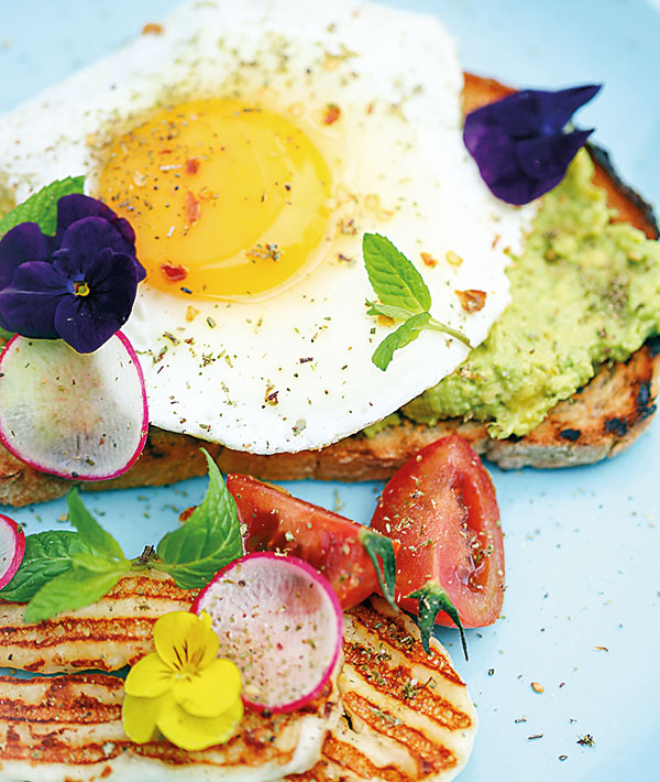 Avocado toast, fried egg & grilled halloumi recipe by Tara Khattar